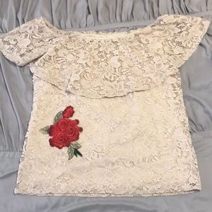 Really cute lace embroidered top. Shot in one time